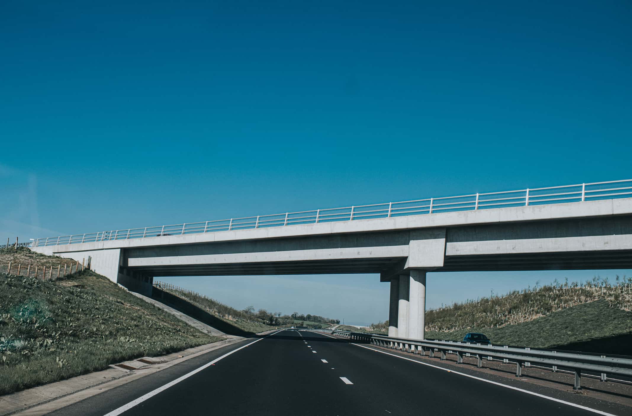 Large concrete bridge over a highway - stock photo/Getty Images