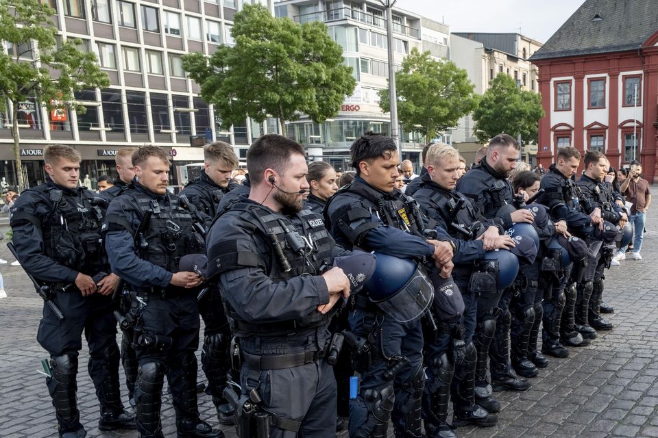 German police officers remember their colleague in Mannheim (Michael Probst/AP)