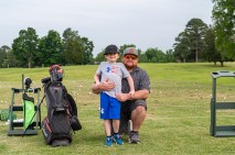 Will Holland with his father Jamie Holland at the Save Mason Rudolph Golf Rally. May 31, 2024 (Jeff Danault)