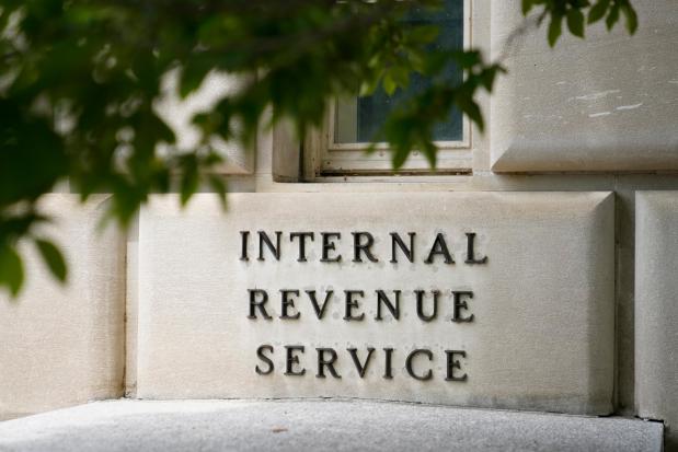 FILE - A sign outside the Internal Revenue Service building is seen May 4, 2021, in Washington.  The IRS said on Friday, April 26, 2024, more than 140,000 taxpayers filed their taxes through its new direct file pilot program.  Users of the program are said to have claimed more than $90 million in refunds, saving about $5.6 million in fees they would have spent with commercial tax preparation companies.  (AP Photo/Patrick Semansky, File)
