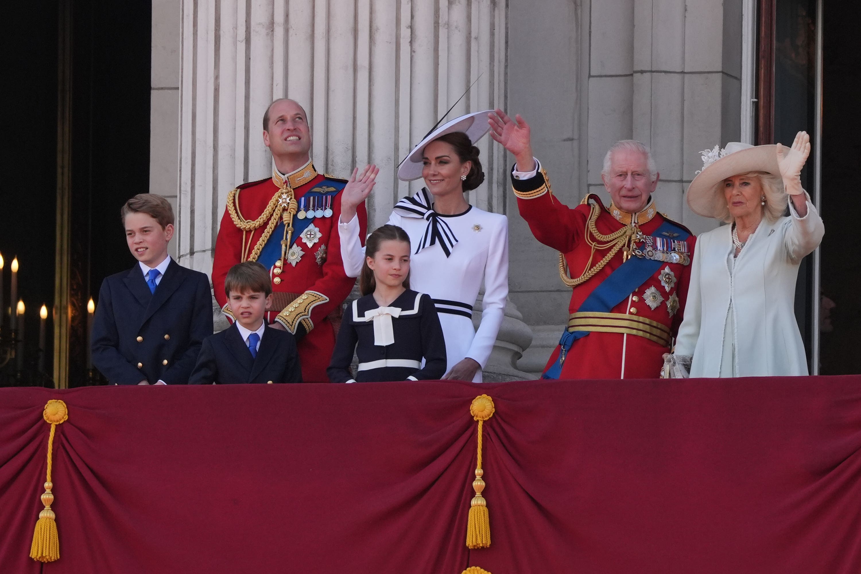 The Prince and Princess of Wales with their children Prince George, Prince Louis and Princess Charlotte and King Charles III and Queen Camilla on the balcony of Buckingham Palace (Gareth Fuller/PA)