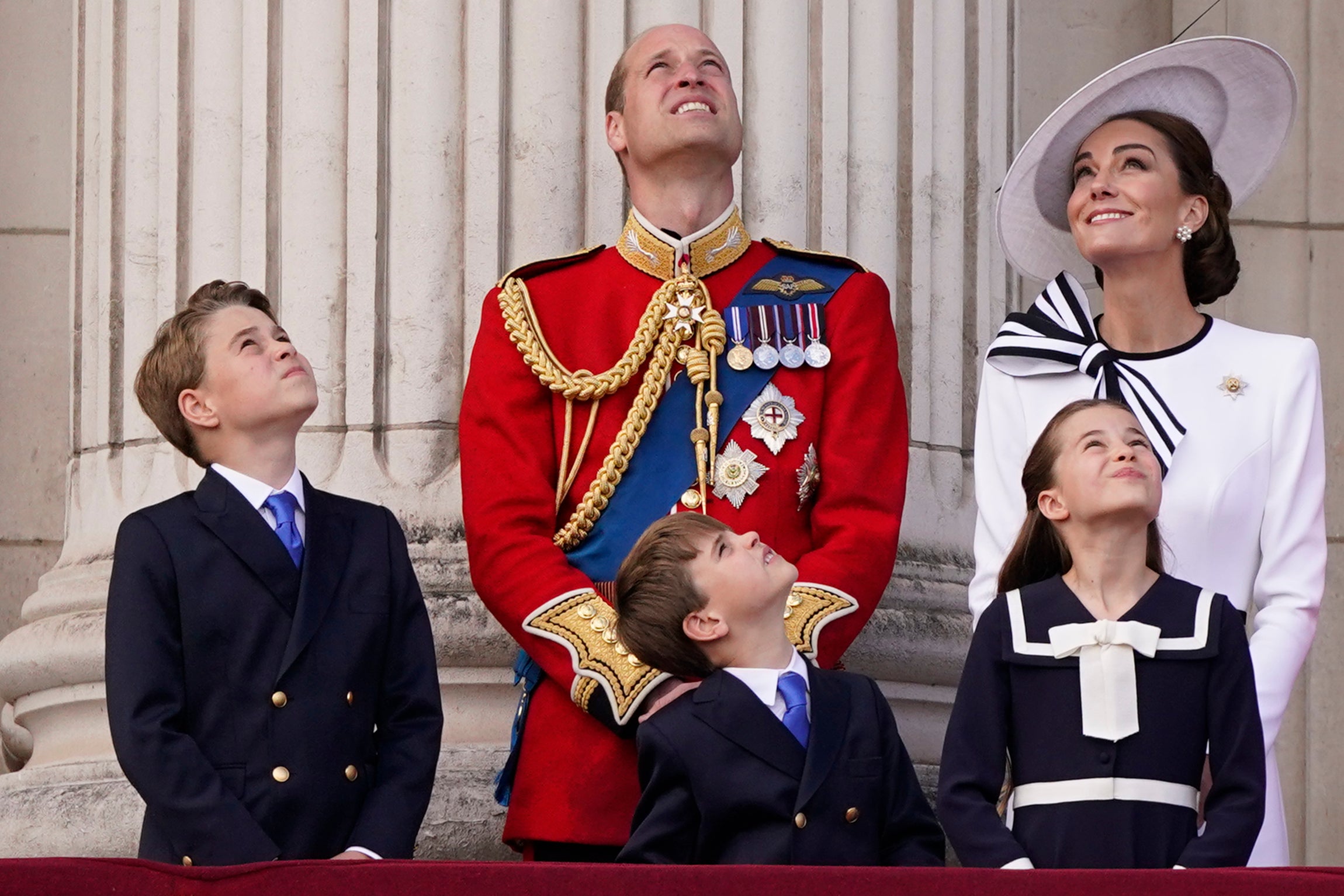 Britain's Prince William with Kate, Princess of Wales, and their children Prince George, left, Prince Louis and Prince Charlotte at the Trooping the Color ceremony